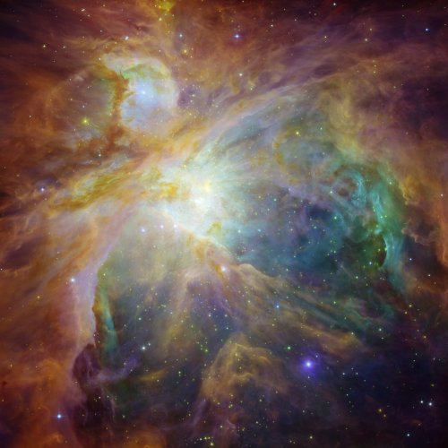 A detailed and colorful Hubble Space Telescope image of the Orion Nebula showcasing star-forming regions and swirling clouds of gas and dust (NASA)