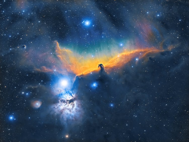 The Horsehead Nebula, a dark nebula with a distinctive horse-head silhouette, glowing amidst colorful cosmic gas and stars.