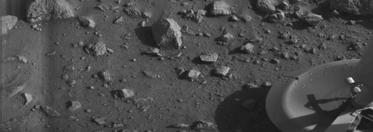 First "clear" image ever transmitted from the surface of Mars &ndash; shows rocks near the Viking 1 Lander (July 20, 1976). The haze on the left is possibly dust that had recently been kicked up by the landing rockets. Because of the "slow scan" facsimile nature of the cameras, the dust settled by mid-image.